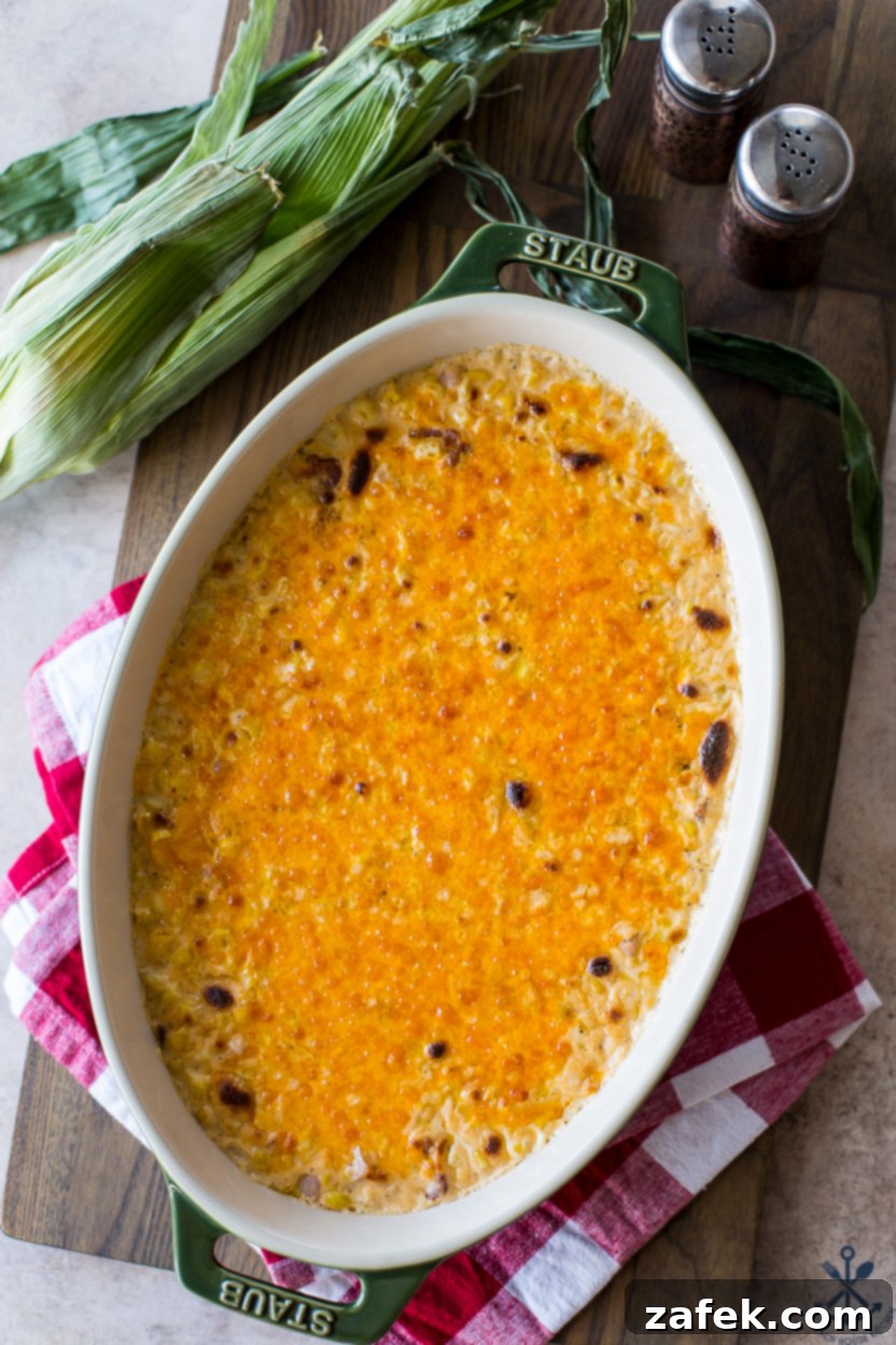 Overhead photo of a baking dish of cheesy corn