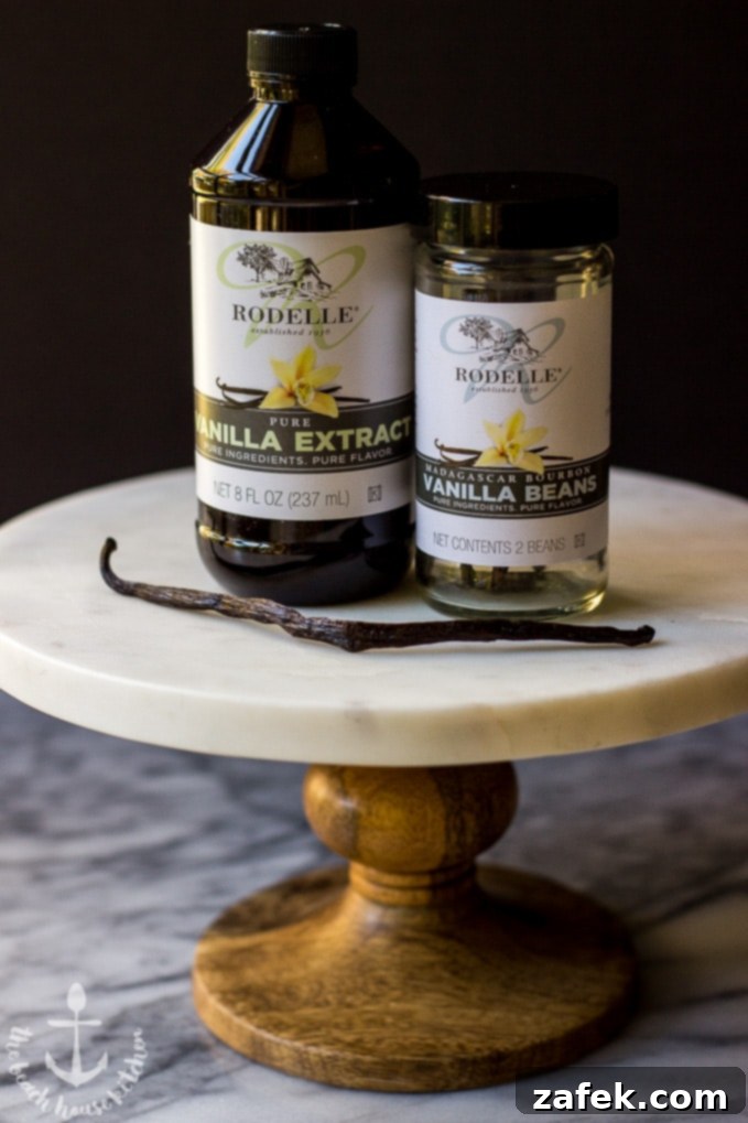 Close-up of a Mini Vanilla Bean Cheesecake with Toasted Coconut Crust and Chocolate Ganache on a Serving Plate
