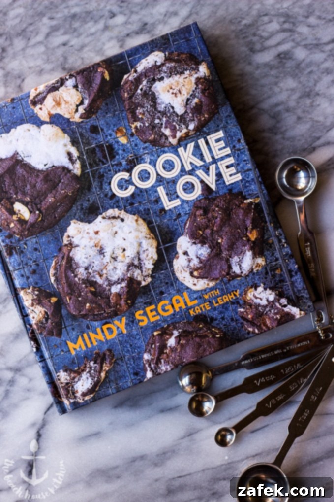 A collection of Mini Vanilla Bean Cheesecakes with Toasted Coconut Crust and Chocolate Ganache, beautifully arranged