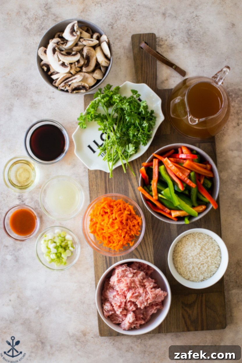 Zesty One-Pan Thai Pork Stir-Fry 4 Overhead photo of ingredients in bowls for a Thai Pork Stir-Fry dinner