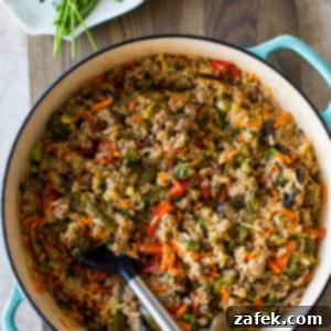 Zesty One-Pan Thai Pork Stir-Fry 8 Overhead photo of a baking dish filled with rice and veggies and pork