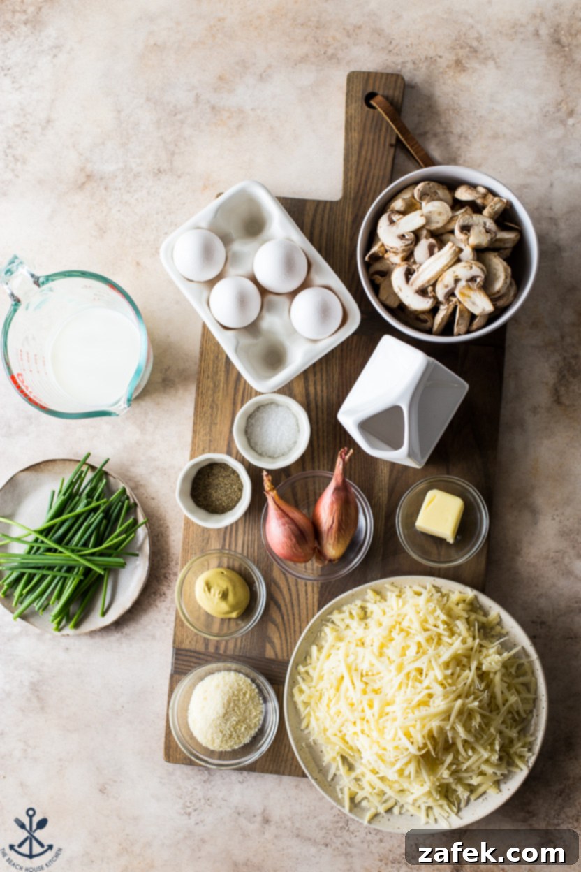 Savory Mushroom Cloud 3 Overhead photo of fresh ingredients for a mushroom quiche laid out on a rustic wooden board, including sliced mushrooms, whole shallots, eggs, heavy cream, and a block of Gruyère cheese