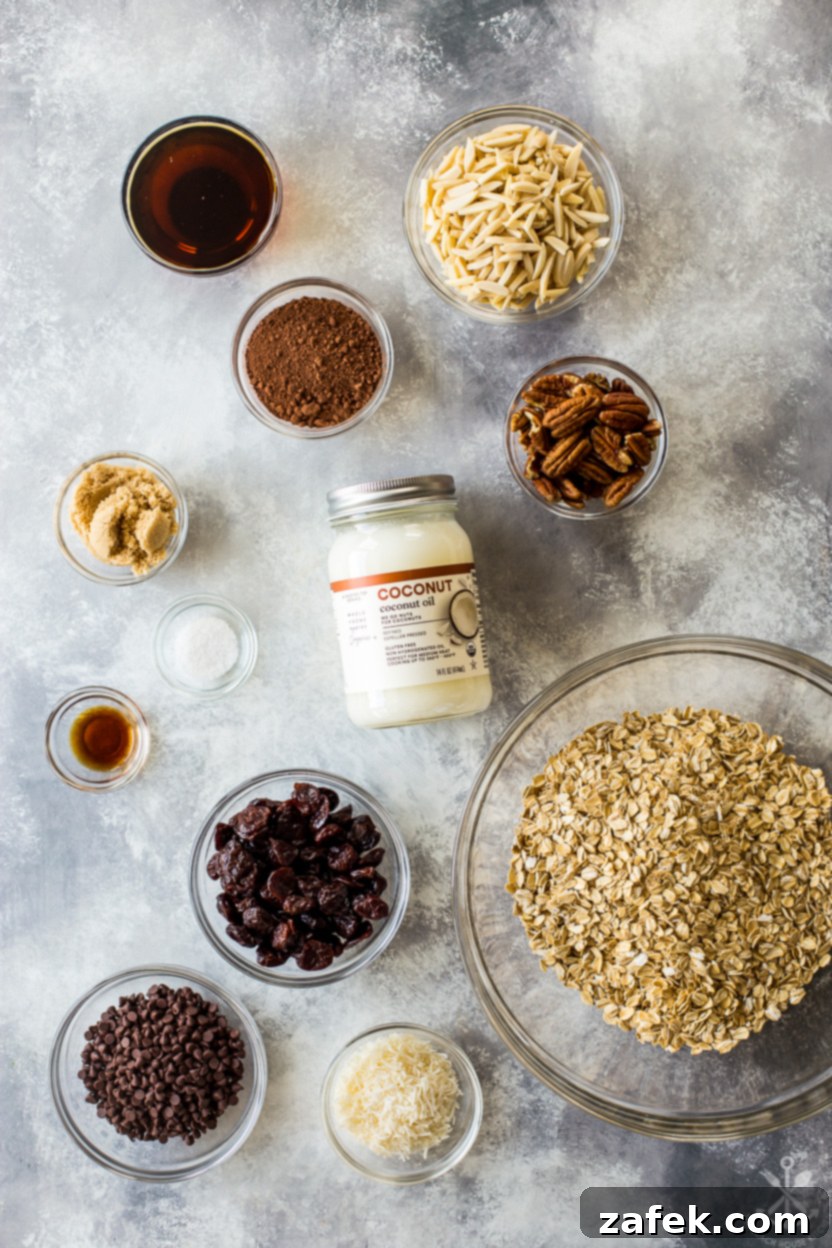 Cherry Chocolate Crunch 4 Overhead photo of a collection of ingredients for chocolate cherry granola laid out on a surface
