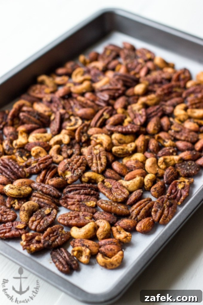 Hearthside Spiced Nuts 3 Close-up of perfectly roasted Spiced Holiday Nuts, showcasing the rich spice coating.