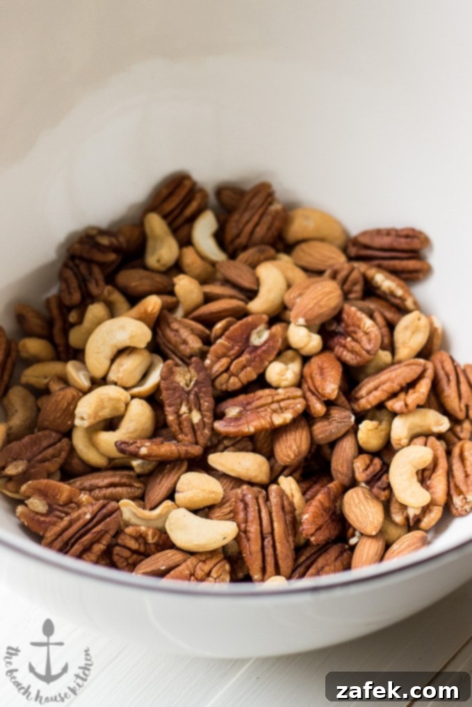 Hearthside Spiced Nuts 4 Spiced Holiday Nuts served in a charming bowl, ready for a party.