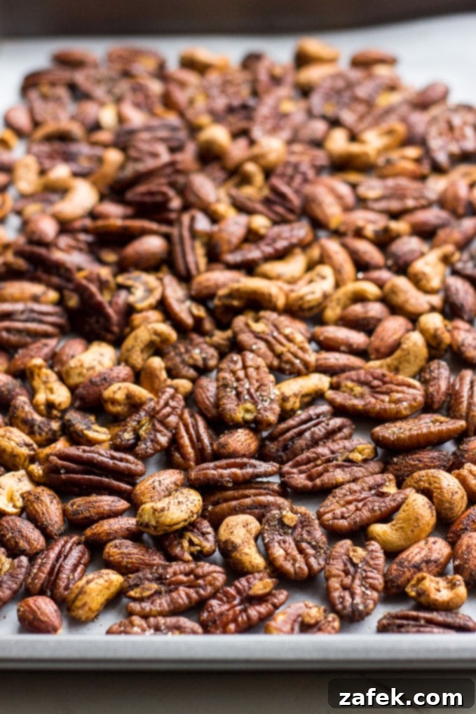 Hearthside Spiced Nuts 5 Spiced Holiday Nuts in small gift bags with ribbons, perfect for hostess gifts.