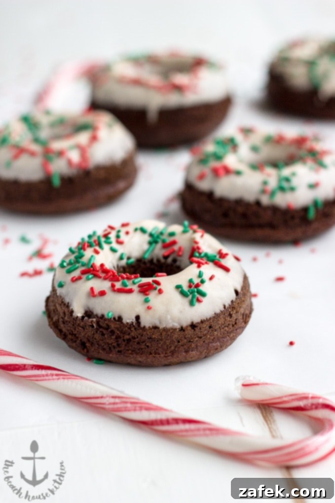 Gingerbread Donut Bliss 6 A close-up shot of a gingerbread donut with glaze, ready to be picked up and enjoyed