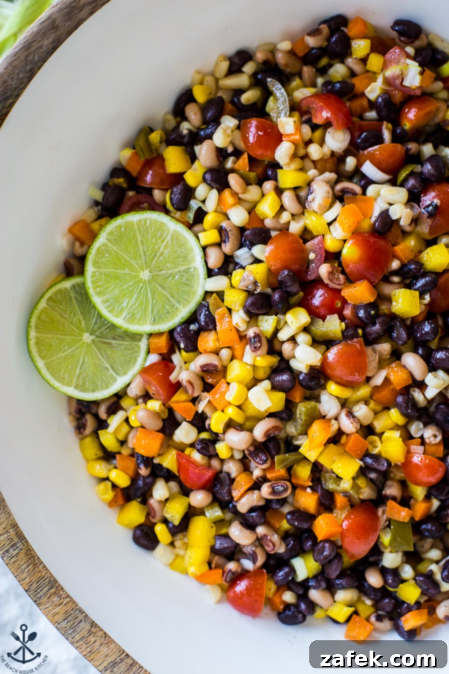 Lone Star Fiesta Salad 4 A tantalizing close-up, overhead view of Texas Caviar, showcasing its vibrant colors and inviting texture as a delicious and healthy dip.