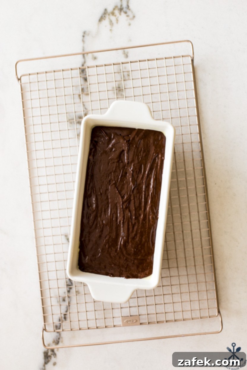 Decadent Chocolate Loaf 6 Overhead photo of a pre-baked chocolate loaf cake