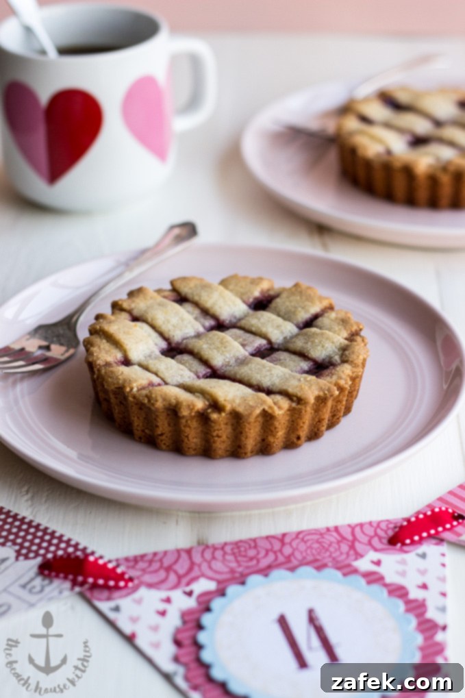 Miniature Linzer Torte - A close-up of the delicate lattice topping and jam filling.