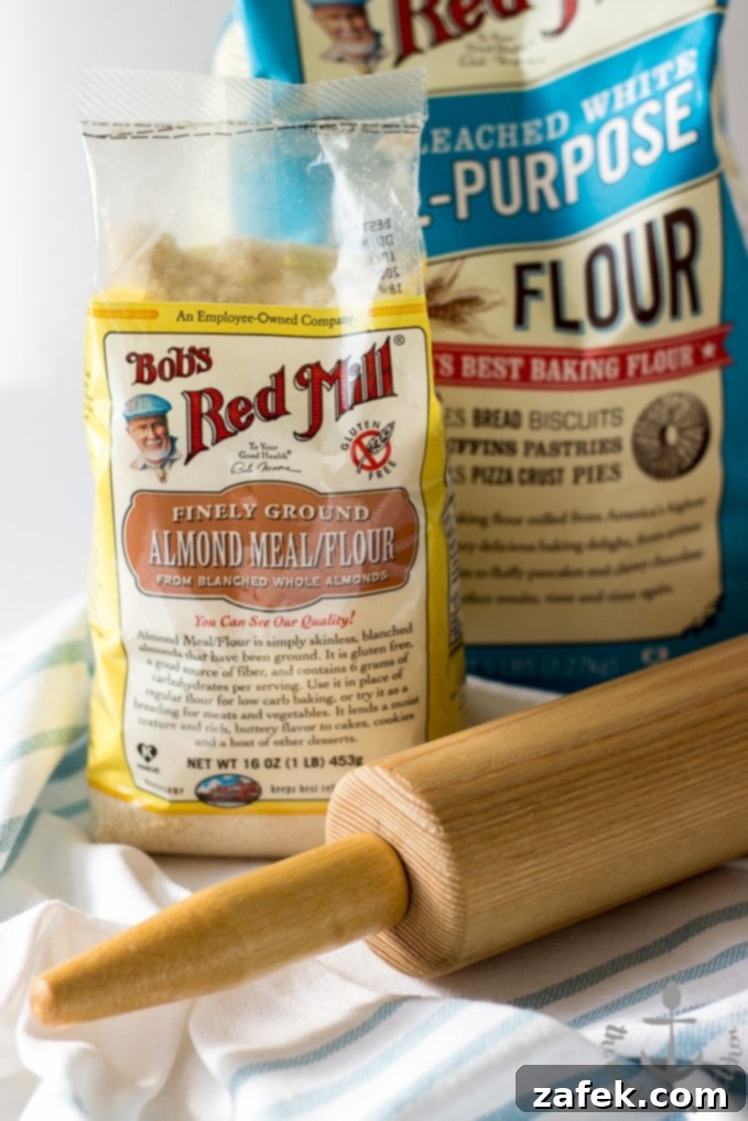 Two Miniature Linzer Tortes, one with a full lattice and another showing the jam.