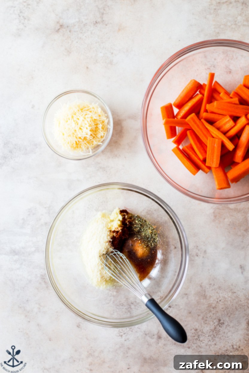 Overhead photo of a bowl full of coating for parmesan carrots, a bowl of sliced carrots and a bowl of shredded parmesan