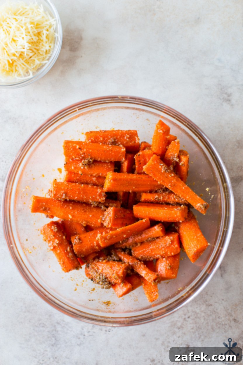 Overhead photo of a bowl of parmesan coated carrots