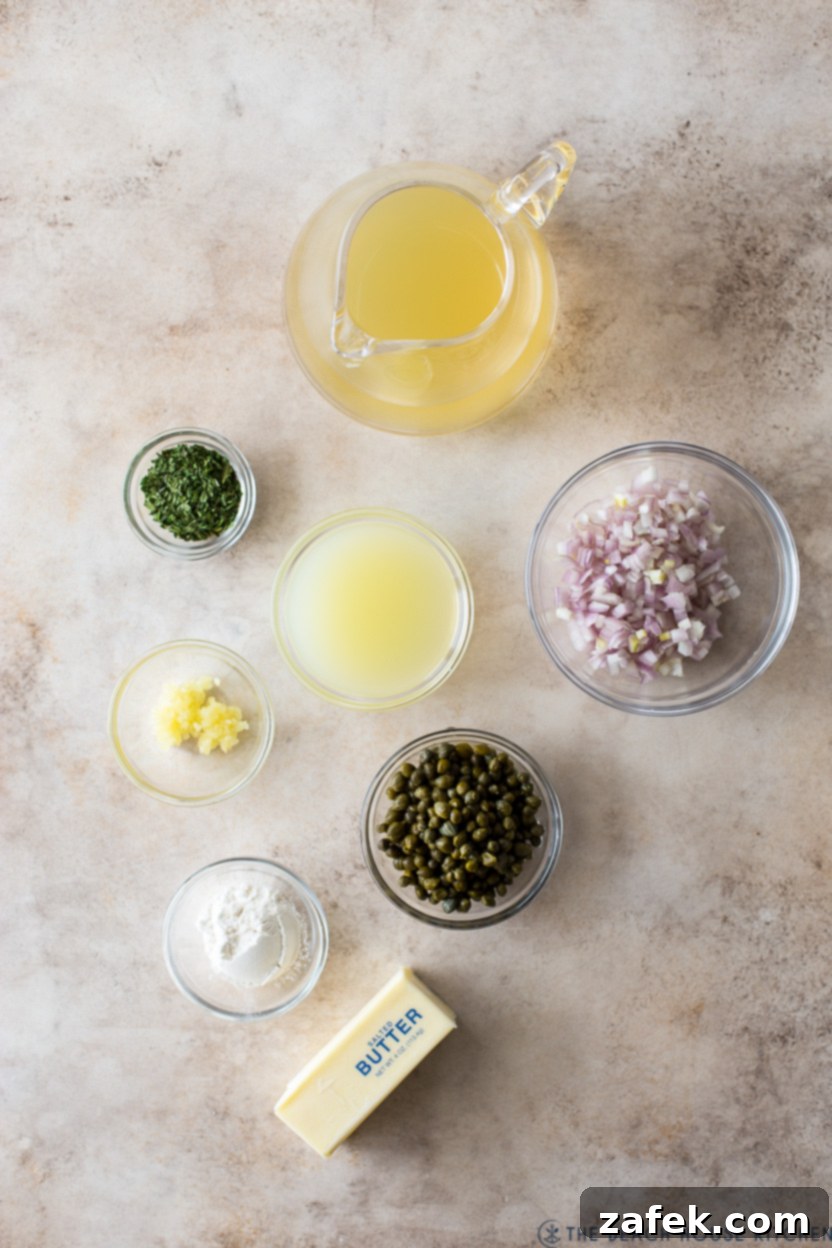 Ingredients for chicken piccata meatballs laid out on a kitchen counter, showcasing fresh and pantry items.
