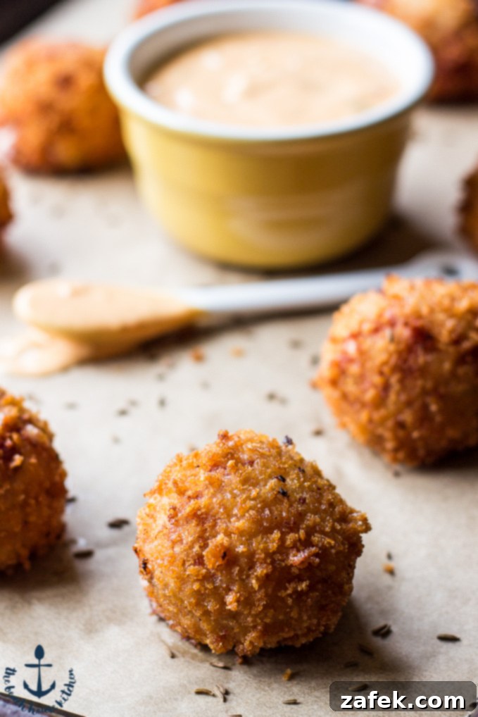 Reuben Poppers Your New Craving 2 Crispy Reuben Poppers served on a platter, ready for a St. Patrick's Day celebration.