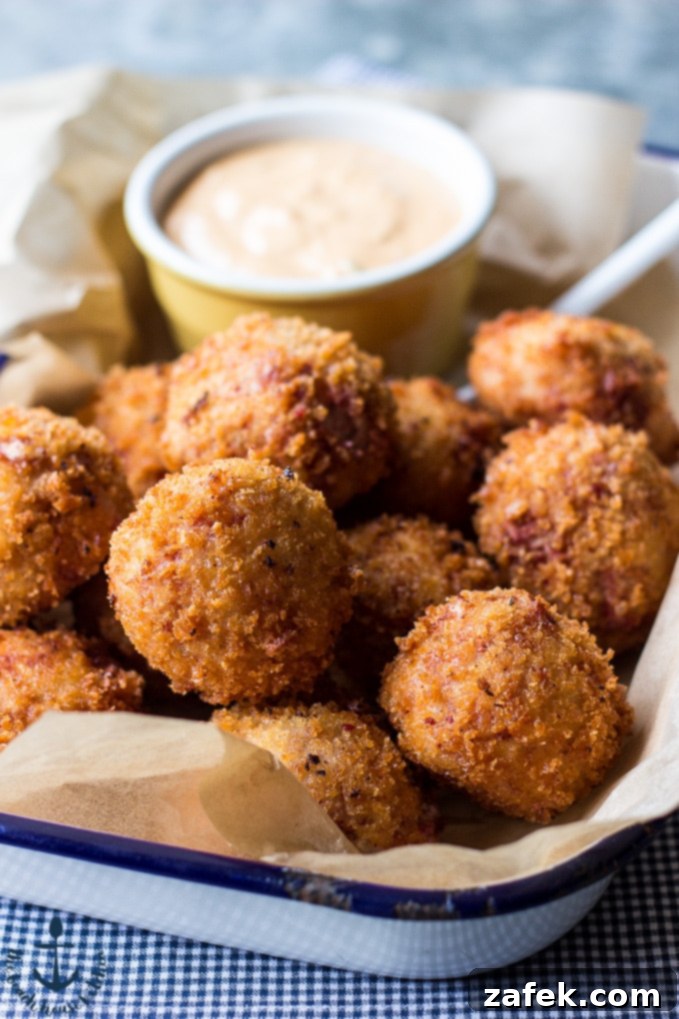 Reuben Poppers Your New Craving 3 Close-up of a perfectly fried Reuben Popper, golden brown and inviting.