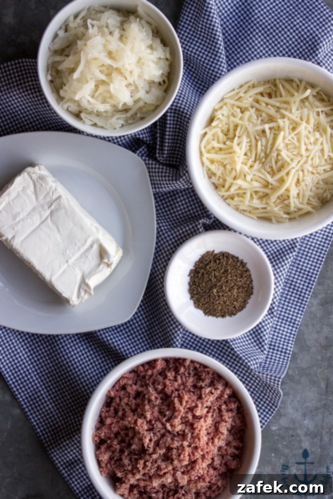 Reuben Poppers Your New Craving 6 A vibrant close-up of a Reuben Popper being dipped into creamy Russian dressing.