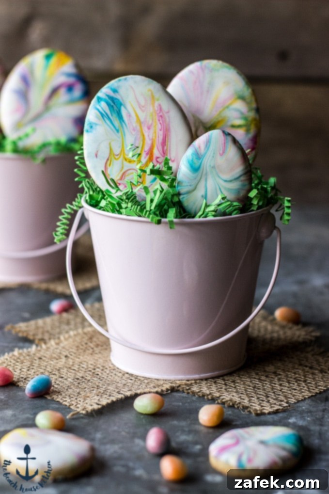 Close-up of a single Easter Egg Sugar Cookie, highlighting the intricate marbled royal icing design