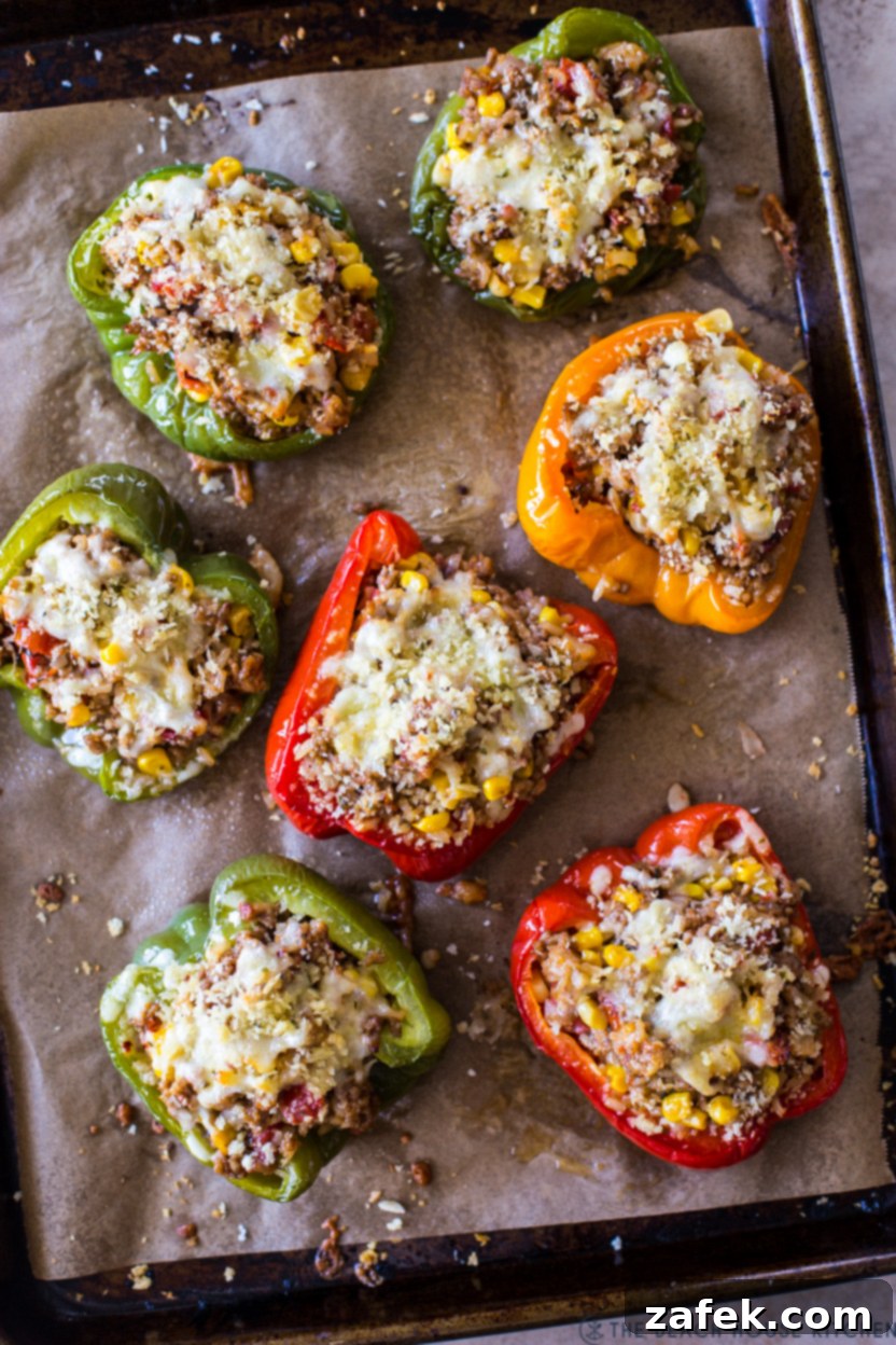Savory Stuffed Peppers 2 Overhead photos of vibrant stuffed bell peppers arranged neatly on a parchment-lined baking sheet, ready for the oven
