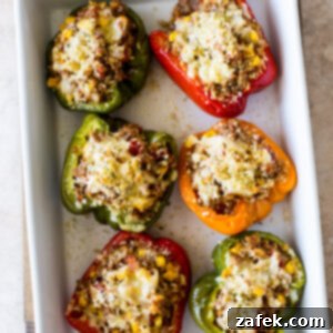 Savory Stuffed Peppers 9 A perfectly cooked stuffed bell pepper, rich with savory filling, garnished with fresh parsley