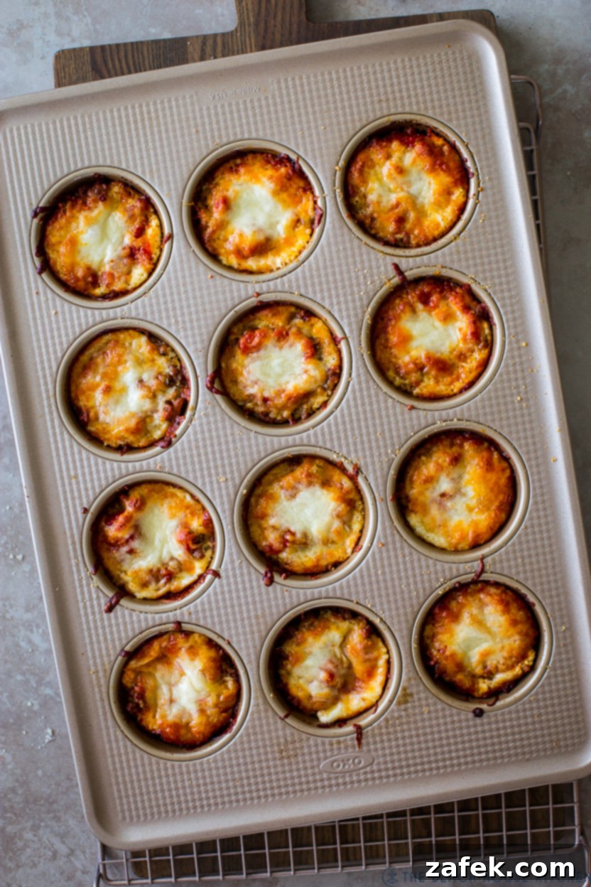 Overhead photo of a muffin pan of baked lasagna cups