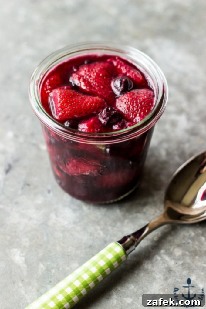 Plated Coconut Crepes with whipped yogurt and berry compote