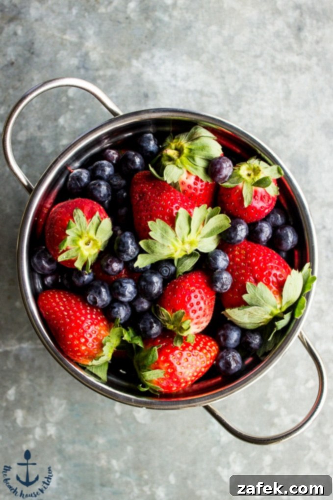 Overhead shot of Coconut Crepes with whipped yogurt and berry compote