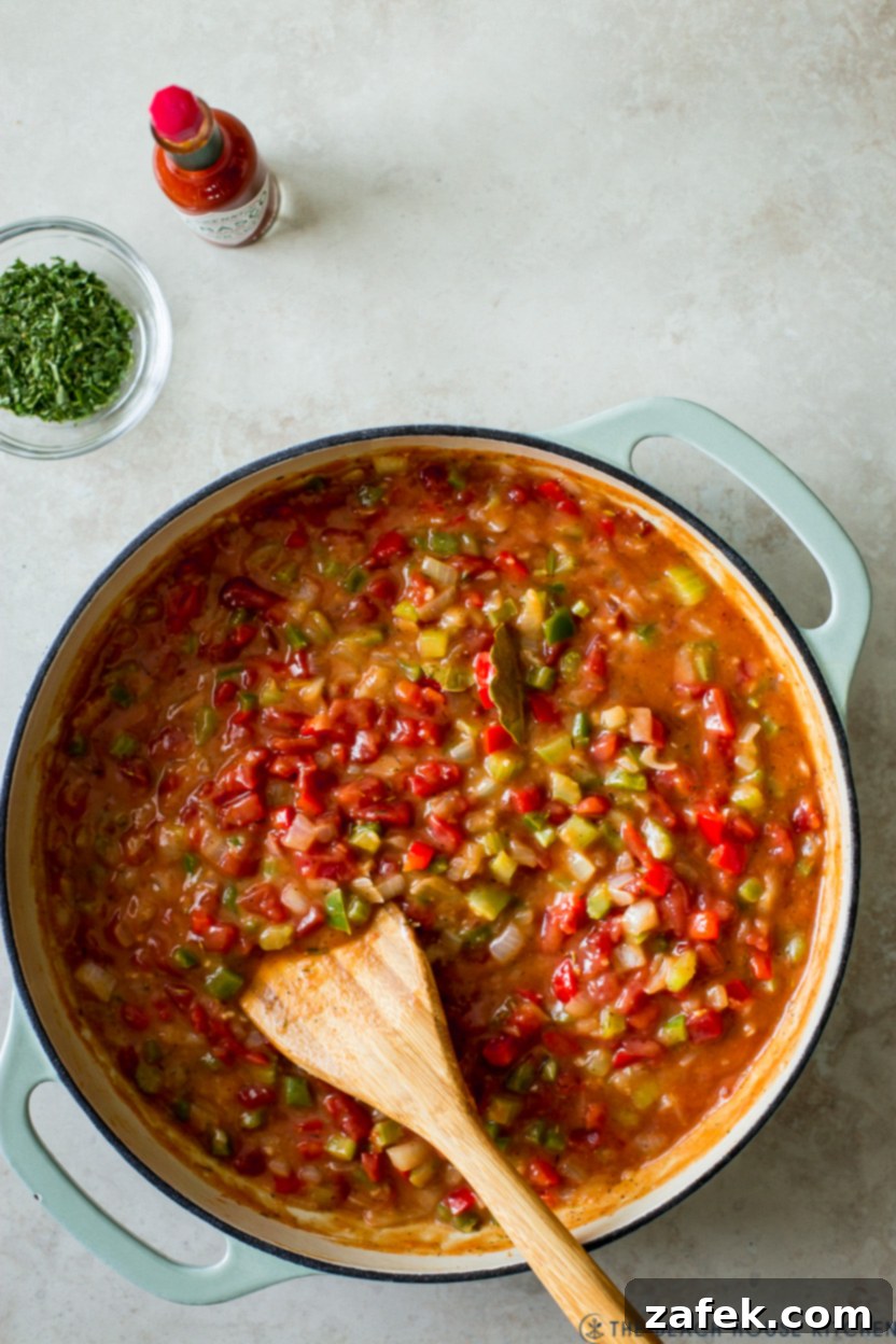 Bayou Shrimp with Creole Kick 6 Up close overhead photo of a veggie mixture in a skillet