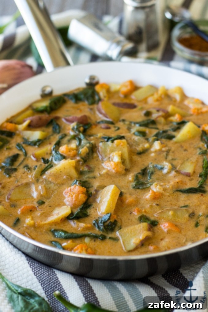 Vibrant Vegetable Curry 3 Close-up of the freshly renovated kitchen counter, showcasing new cabinets and a clean aesthetic.