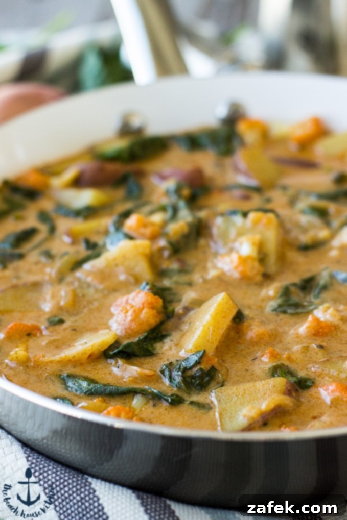 Vibrant Vegetable Curry 6 Close-up of a serving of Vegetable Curry in a bowl with rice, ready to be enjoyed.
