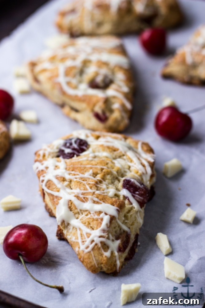 Freshly baked Cherry Vanilla Scones with White Chocolate Drizzle