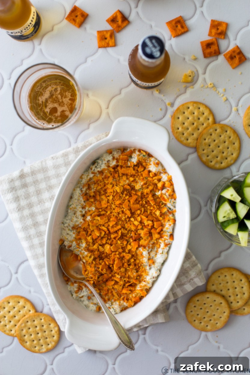 Close-up of Dill Pickle Dip showing the texture and crushed Cheez-It topping.