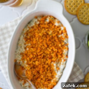 Dill Pickle Dip served in a small white dish.