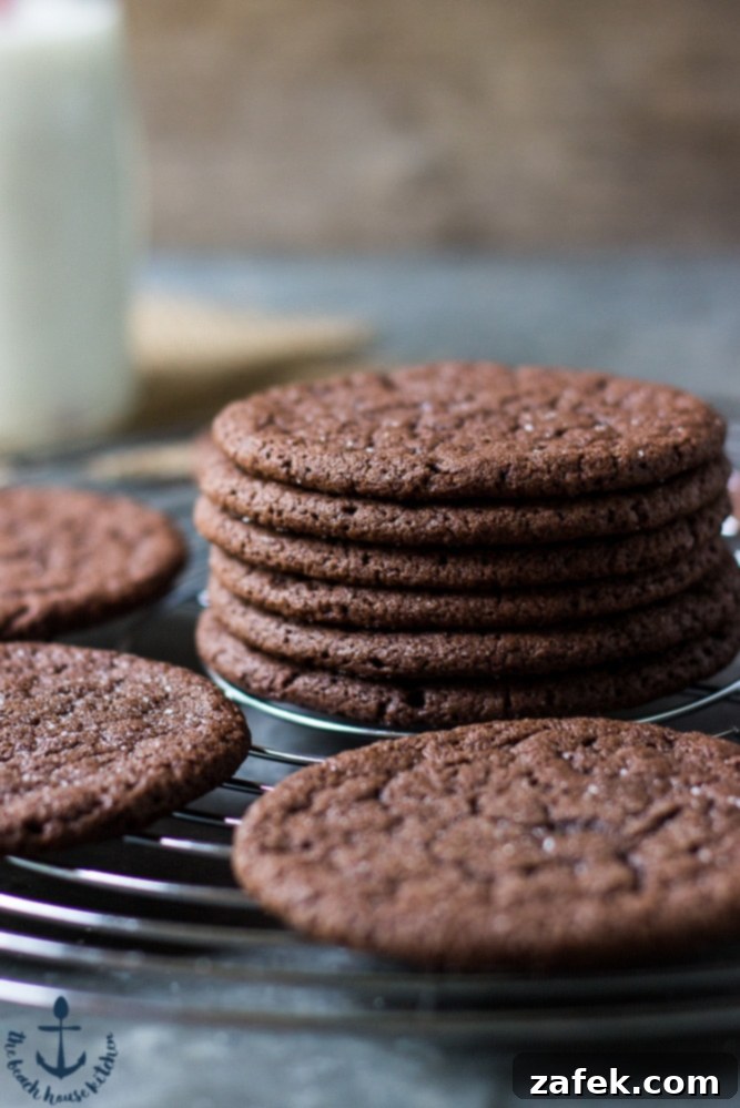 Detailed shot of a stack of Mexican Chocolate Cookies, emphasizing their rich color and inviting texture