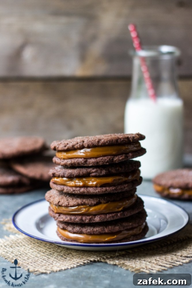 A beautiful stack of three Mexican Chocolate Sandwich Cookies with thick Dulce de Leche filling, ready to be enjoyed