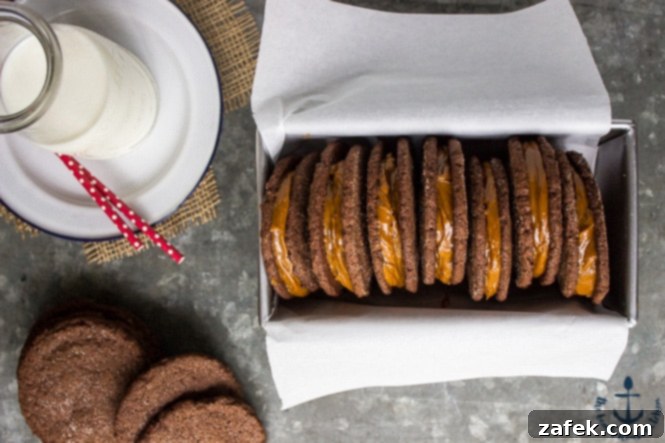 Another overhead shot of Mexican Chocolate Sandwich Cookies with Dulce de Leche filling, beautifully arranged in a rustic loaf pan, highlighting their inviting appearance