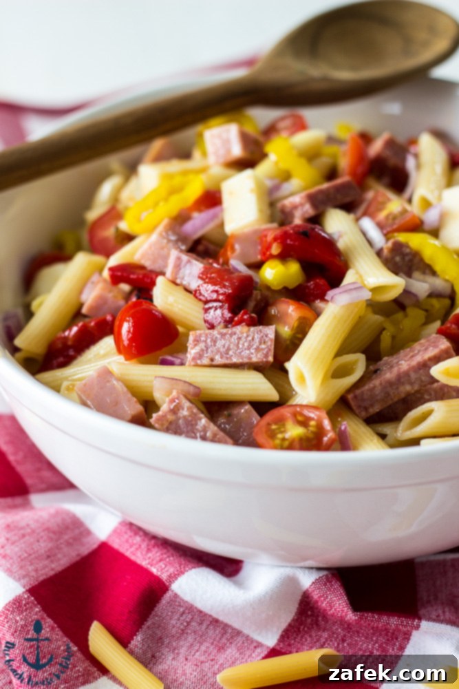 Sean's Antipasto Pasta Salad, a vibrant mix of pasta, deli meats, cheese, and vegetables perfect for summer