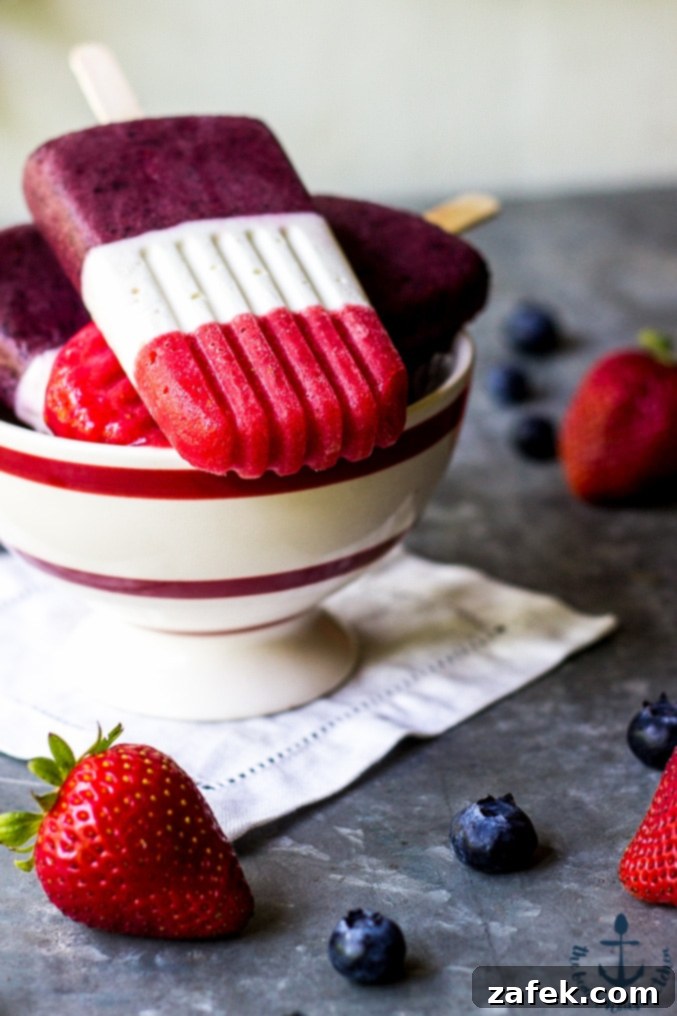 A tray of Berry Cheesecake Popsicles ready for serving.