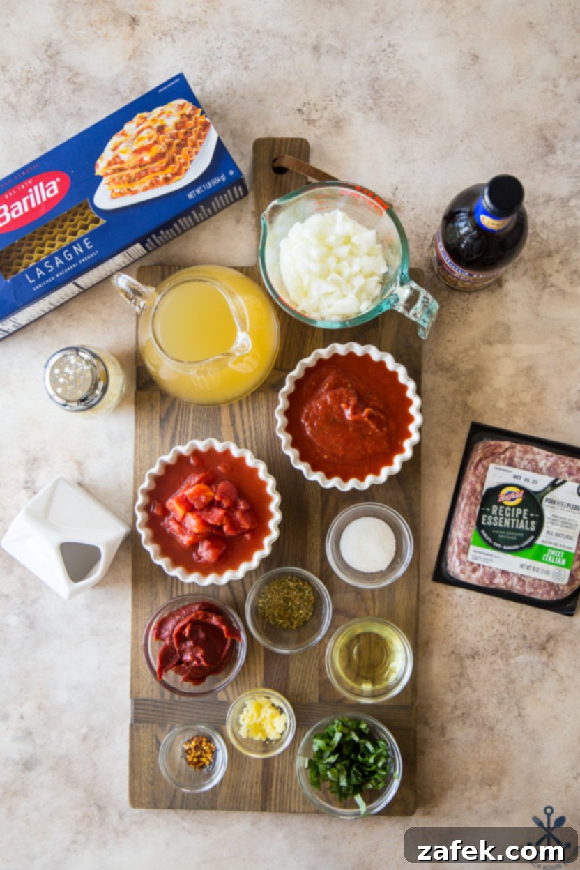 Hearty Lasagna Soup 4 Overhead photo of fresh ingredients for lasagna soup, including tomatoes, basil, and cheese