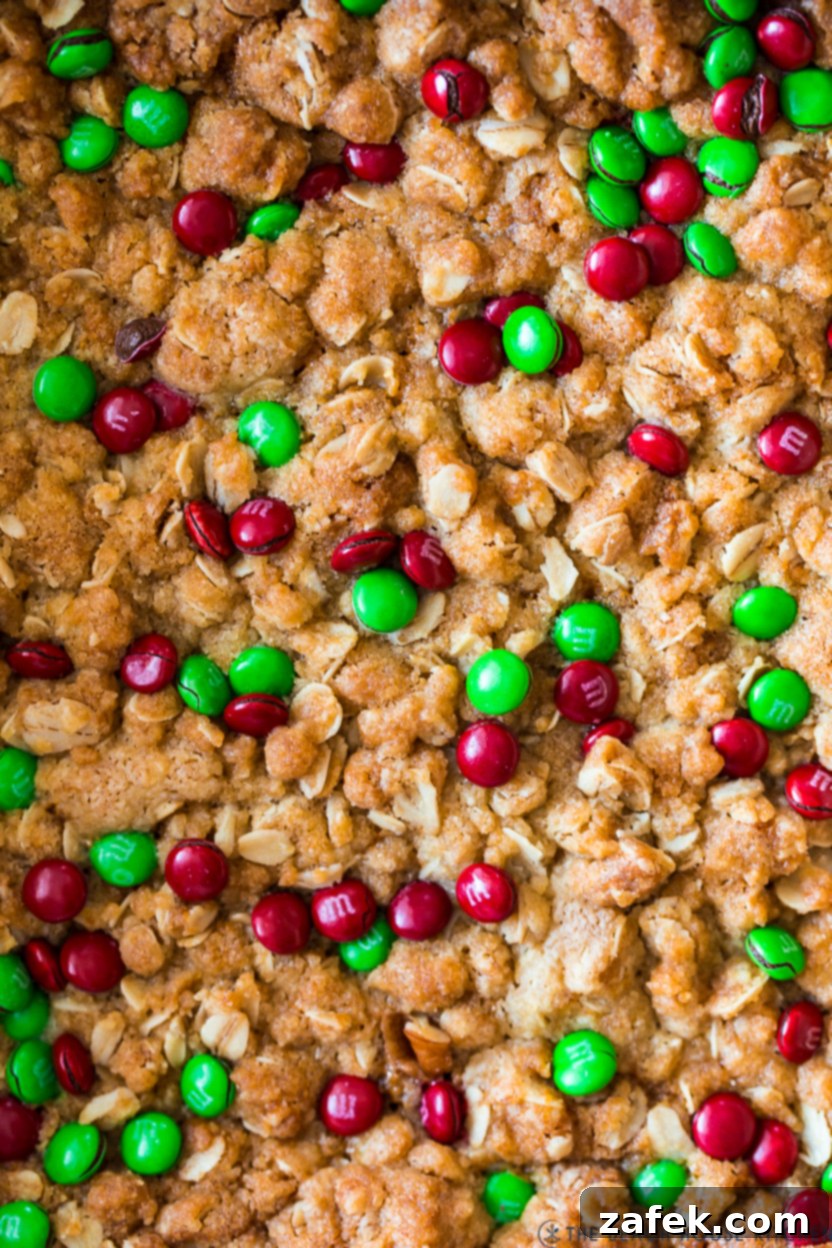 Effortless Carmelita Squares 10 Super up close photo of carmelitas bars, showing the gooey caramel and chocolate texture