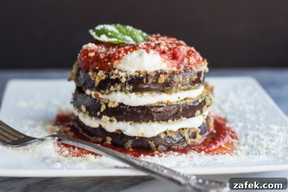 Aubergine Towers 3 Close-up of freshly prepared Eggplant Stacks before baking