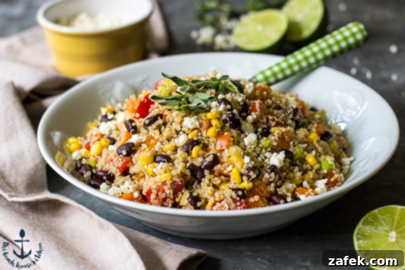 Vibrant Southwest Quinoa Salad with Tangy Lime and Cotija 3 A beautifully presented Southwestern Quinoa Salad with Lime Dressing and Cotija Cheese in a white bowl, ready to be served.