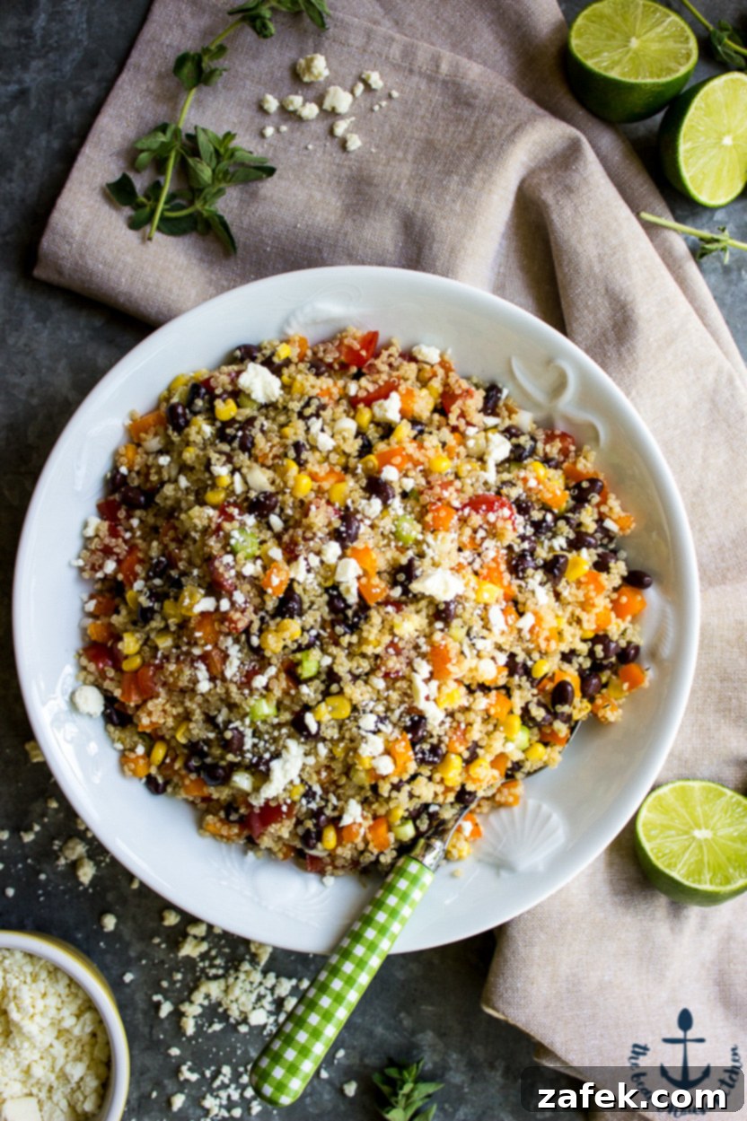 Vibrant Southwest Quinoa Salad with Tangy Lime and Cotija 6 Overhead photo of a freshly prepared Southwestern Quinoa Salad in a white bowl, ready to be enjoyed.