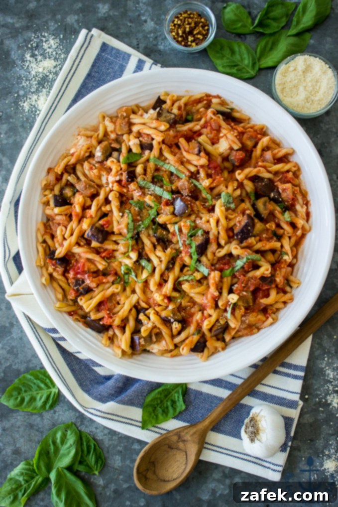 Sweet and Savory Burrata Pasta with Eggplant and Caramelized Onion 2 Delicious Eggplant, Caramelized Onion, Tomato and Burrata Pasta ready to be served