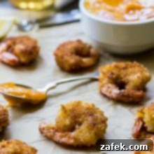 Mango Chipotle Glazed Popcorn Shrimp 7 Popcorn Shrimp with Mango Chipotle Sauce