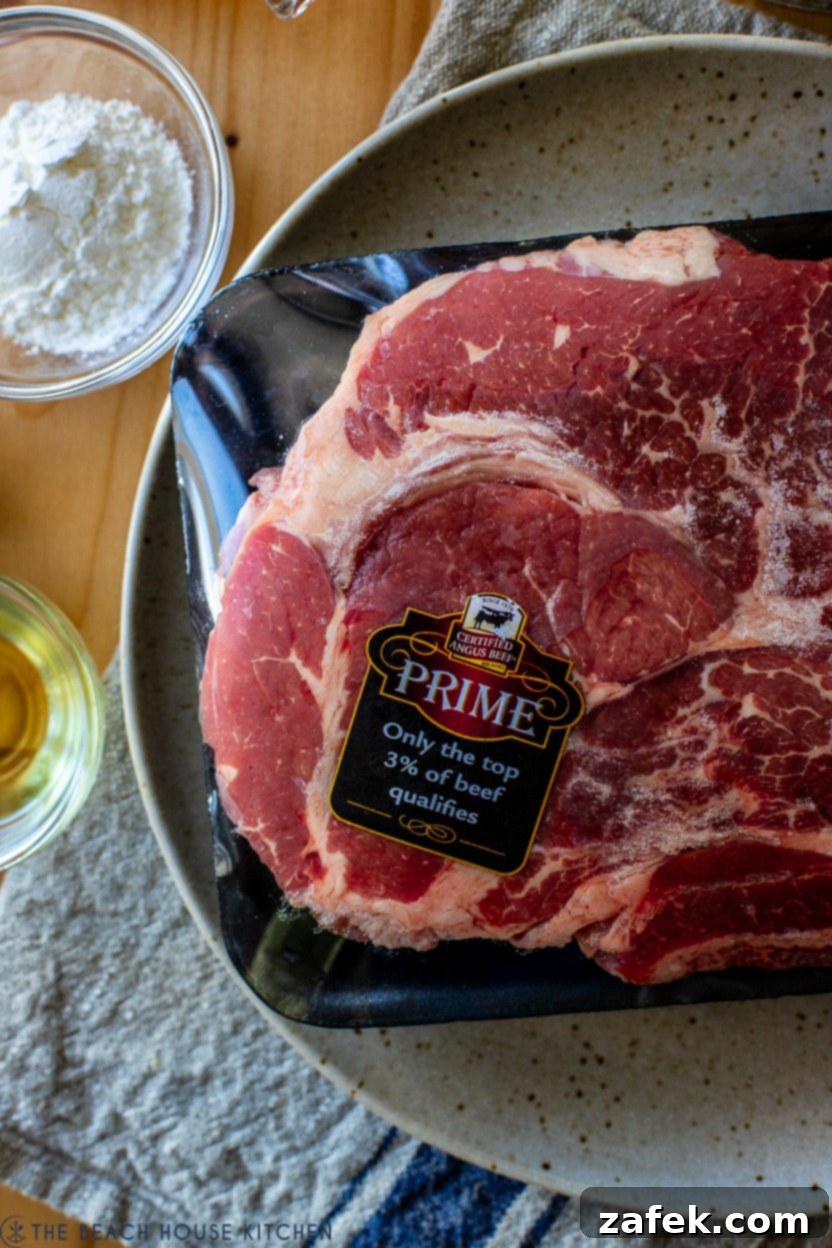 Close-up overhead photo of a high-quality Certified Angus Beef Prime chuck roast, raw and ready for preparation